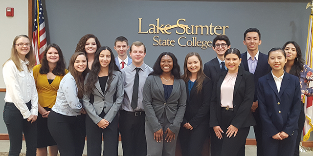 A group of Honors students in business attire at Lake-Sumter State College
